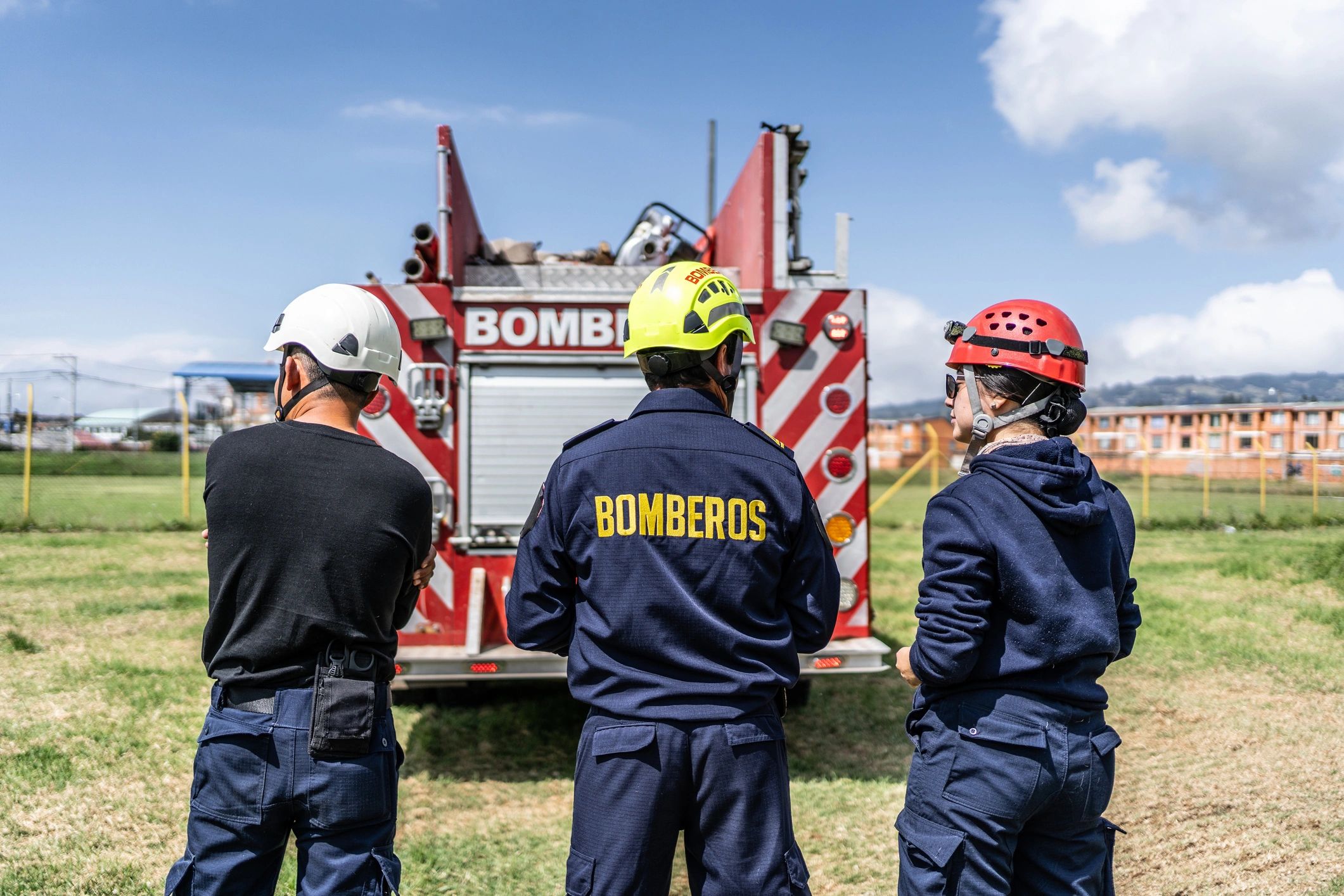 Firefighters in discussion during academy training